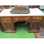 An Edwardian twin pedestal desk with marble top