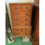 A small walnut 1920s walnut chest on chest of eight drawers on cabriole legs