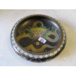 An early 20th Century cloisonné bowl dragon on a black background.