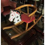 A 1960's child's tricycle and 1960's rocking horse made from beechwood marked Herlag, Germany