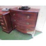 A small 19th Century bow front chest of two short and two long drawers on tapered supports.
