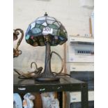 A Tiffany style modern table lamp.