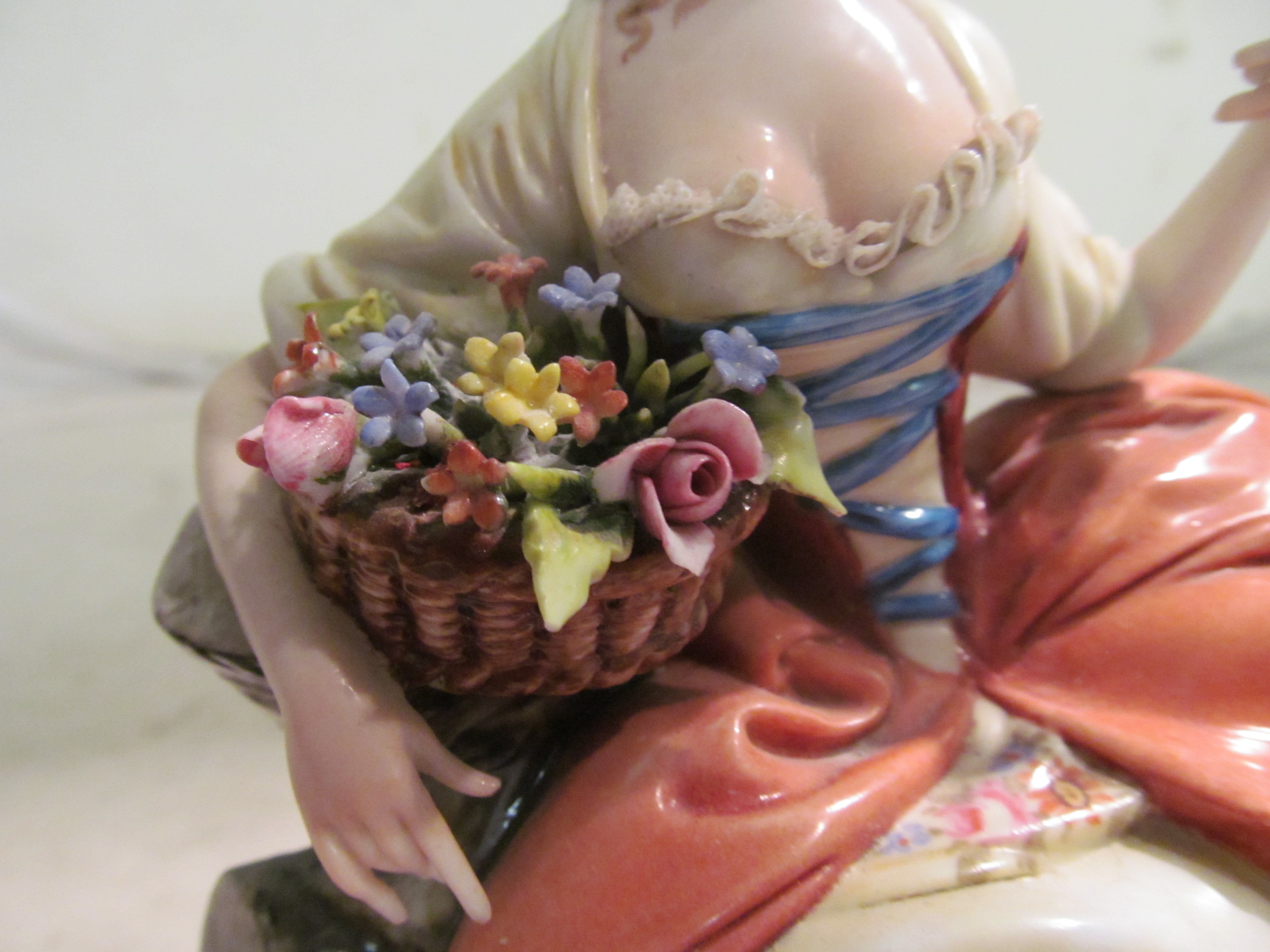 A Capodimonte figure lady with basket of flowers holding a dove - Image 8 of 22