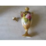 A pair of Royal Worcester two handled lidded urn shaped vases hand painted roses No247 1 lid (a/f)