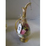 A small Royal Worcester ewer hand painted roses signed E Spilsbury No242