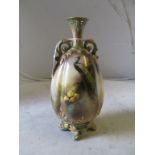 A Hadley Worcester two handled vase hand painted peacock with leaf base signed H Martin (base