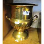 A brass urn shaped two handled wine cooler.