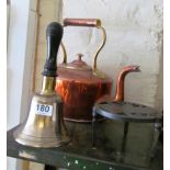 A 19th Century copper kettle, brass bell and a trivet
