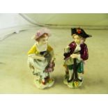 A 19th Century German figure gallant and lady and another pair of figures