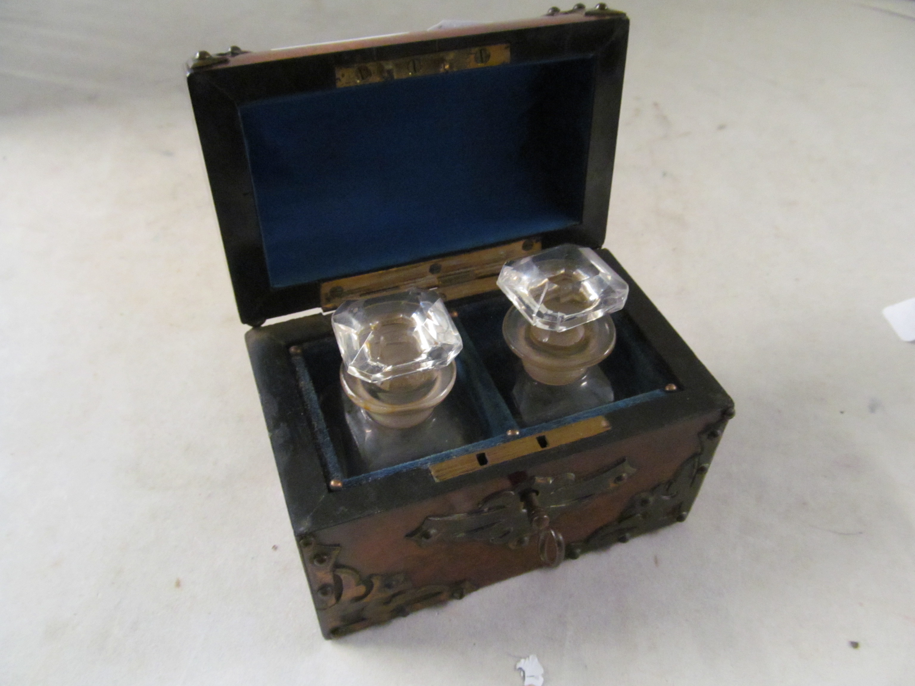 A small walnut and brass dome top box containing two glass bottles - Image 2 of 3