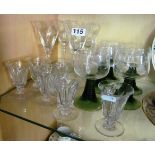 A set of five green stem rummers, six liquer glasses and four conical wine glasses
