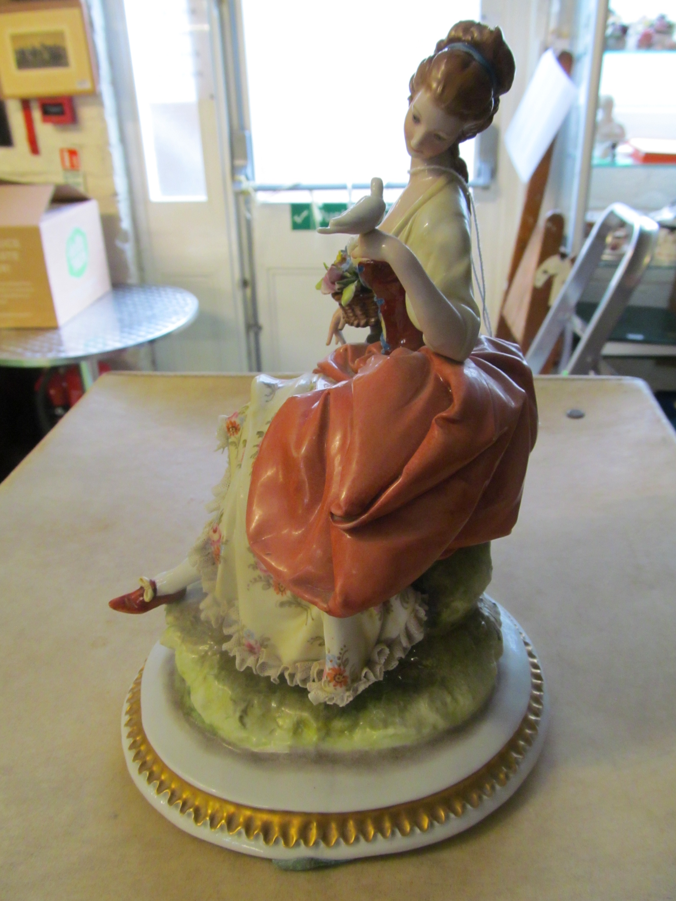 A Capodimonte figure lady with basket of flowers holding a dove - Image 20 of 22