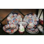 Two Japanese Imari large plates, a bowl and three smaller plates (sa/f)