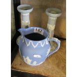 A Wedgwood jasperware jug and a pair of candlesticks