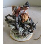 A Capodimonte figure man with donkey