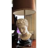 A table lamp Roman head