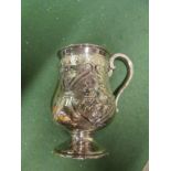 A Victorian silver christening mug embossed flowers