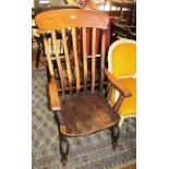 A 19th Century farmhouse chair with bobbin turned arm supports