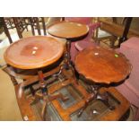 Three circular top wine tables