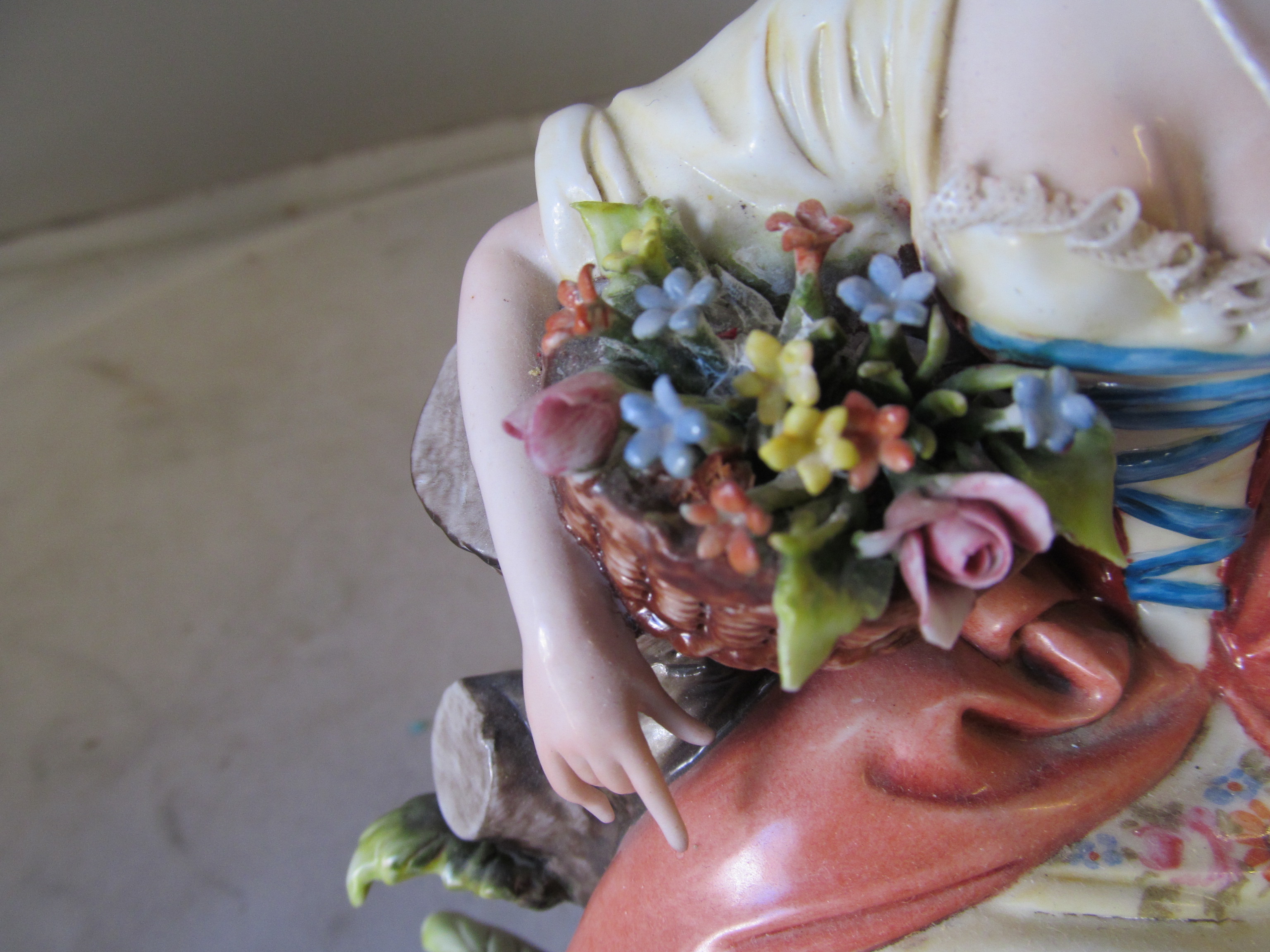 A Capodimonte figure lady with basket of flowers holding a dove - Image 3 of 22