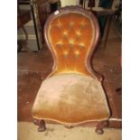 A Victorian chair cabriole supports