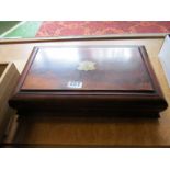 A mahogany box with tray liner