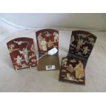 A set of four chinoiserie bookends applied mother of pearl figures (one pair of stands)