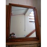 A 19th Century walnut framed mirror.