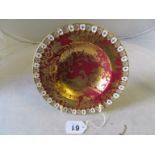 A Royal Crown Derby bowl with gilt bird design on red ground