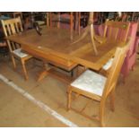 A drawleaf table and 4 chairs