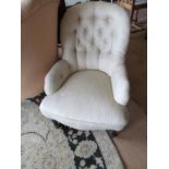 A Victorian chair on turned supports