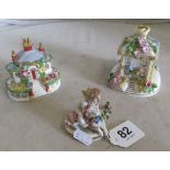 A Coalport 'Keepers Cottage' (a/f) and another 'Summer House.' and a small figure cherub with sheep