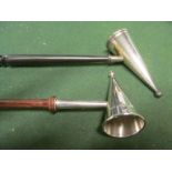 A silver candlesnuffer with turned wood handle and another with twist handle