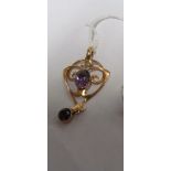 A 9ct Edwardian pendant set amethyst