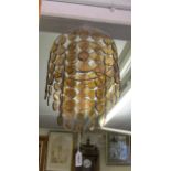 A retro smoked glass ceiling light