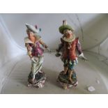 A pair of late 19th Century pottery figures Cavalier and his wife both holding swords