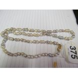 A pearl necklce with 14K clasp