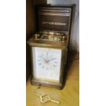 A Matthew Norman brass cased carriage clock