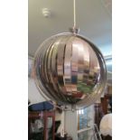 A silver coloured Care Designs orbital ceiling light