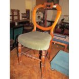 A pair of Edwardian chairs with pierced back splats and a Victorian chair