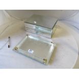 A mirrored jewellery box and a mirrored tray