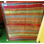 A framed small kelim rug