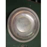 A sterling silver bowl with pierced edge