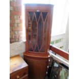 A yew corner cabinet