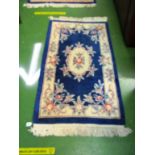 Two blue ground chinese rugs floral design