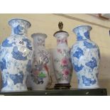 A pair of reproduction blue and white vases fish design, another vase exotic bird amongst flowers