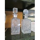 Two cut glass decanters