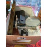 A small magnifier on stand with clips, geometry set, wooden rule etc