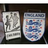 A metal Three Lions England plaque and a Children Playing sign