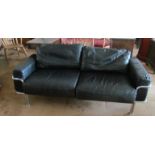 A black leather and chrome settee